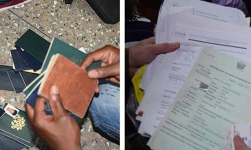 Ghana thu giữ hơn 150 hộ chiếu và giấy tờ khác tại đại sứ quán Mỹ giả. Ảnh: CNN.