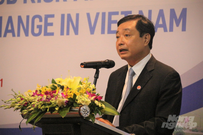 Ông Trần Quang Hoài phát biểu tại Hội nghị 'Tăng cường năng lực quản lý rủi ro lũ tổng hợp trong bối cảnh biến đổi khí hậu'. Ảnh: Phạm Hiếu.