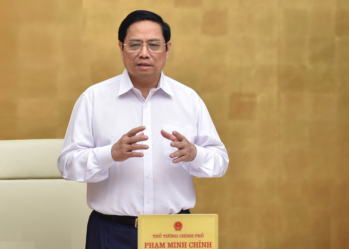 Thủ tướng Phạm Minh Chính nêu rõ việc phục hồi, mở cửa kinh tế phụ thuộc rất lớn vào phòng, chống dịch. Ảnh: VGP/Nhật Bắc.