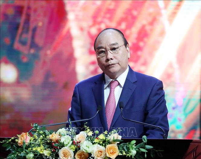 Chủ tịch nước Nguyễn Xuân Phúc phát biểu tại Lễ trao Giải Báo chí Quốc gia lần thứ XV. Ảnh: Thống Nhất/TTXVN.