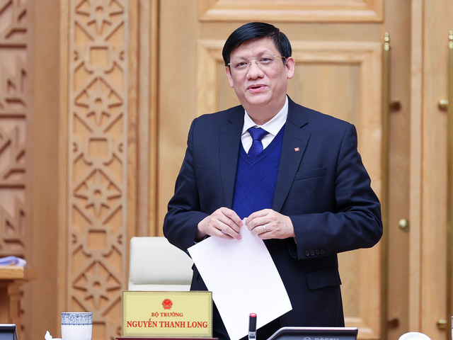 Bộ trưởng Bộ Y tế Nguyễn Thanh Long báo cáo tình hình kiểm soát dịch Covid-19 và tiêm vacxin trong dịp Tết Nguyên đán Nhâm Dần. Ảnh: VGP/Nhật Bắc.
