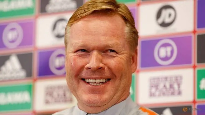 Ronald Koeman đã đồng ý việc chuyển tới Barcelona. Ảnh: Channelnewsasia.