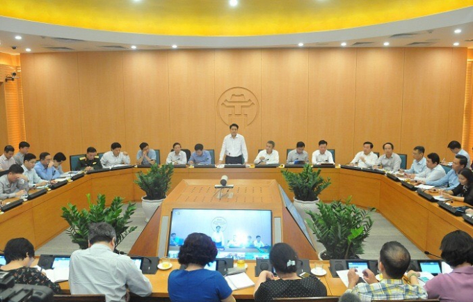Ông Nguyễn Đức Chung chủ trì cuộc họp Ban Chỉ đạo phòng chống dịch Covid- 19 Thành phố Hà Nội diễn ra vào chiều nay 9/3. Ảnh: Huyền Anh.