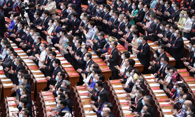 Các đại biểu dự phiên bế mạc kỳ họp quốc hội thường niên tại Đại lễ đường Nhân dân ở Bắc Kinh hôm nay. Ảnh: Xinhua.