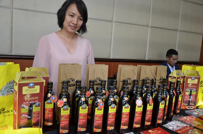 Traditional fish sauce products are displayed at the launching ceremony. Photo: Duong Dinh Tuong.