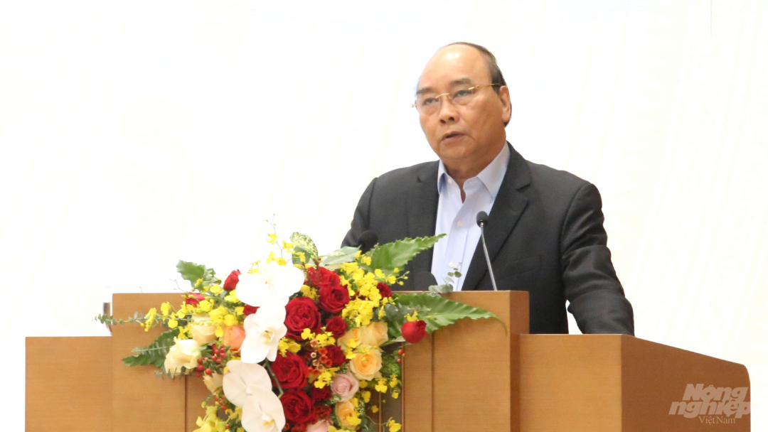 Thủ tướng Chính phủ Nguyễn Xuân Phúc chia sẻ về câu chuyện phát triển 'Tam nông' vào chiều 12/12 tại Hà Nội. Ảnh: Minh Phúc.