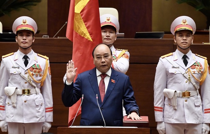 Chủ tịch nước Nguyễn Xuân Phúc tuyên thệ sáng 26/7. Ảnh: Giang Huy.
