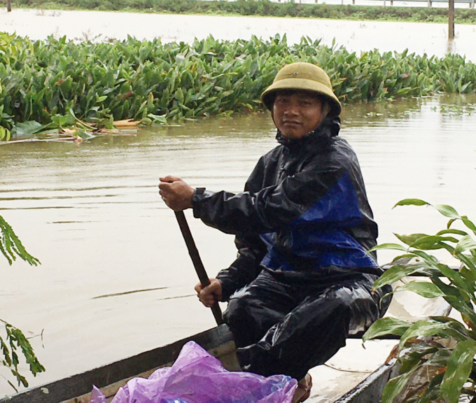 Vùng trồng hoa màu huyện Quảng Ninh đang bị lũ ngập sâu. Ảnh: B. Châu