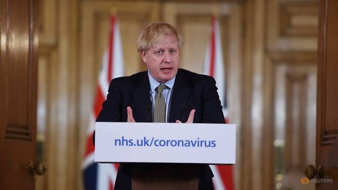 Thủ tướng Anh, ông Boris Johnson, tham dự một cuộc họp báo về tình hình Covid-19 ở London. Ảnh: Eddie Mulholland/Reuters.