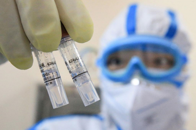 Thế giới đang tăng tốc điều chế vắc xin chống SARS-CoV-2. Ảnh minh họa: AFP/Getty.