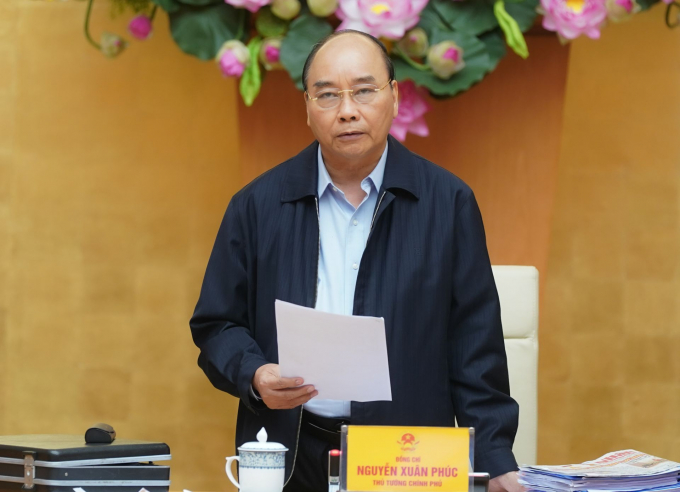 Thủ tướng Chính phủ Nguyễn Xuân Phúc ký Quyết định 447/QĐ-TTg công bố dịch Covid-19 trên phạm vi toàn quốc. Ảnh: VGP/Quang Hiếu.
