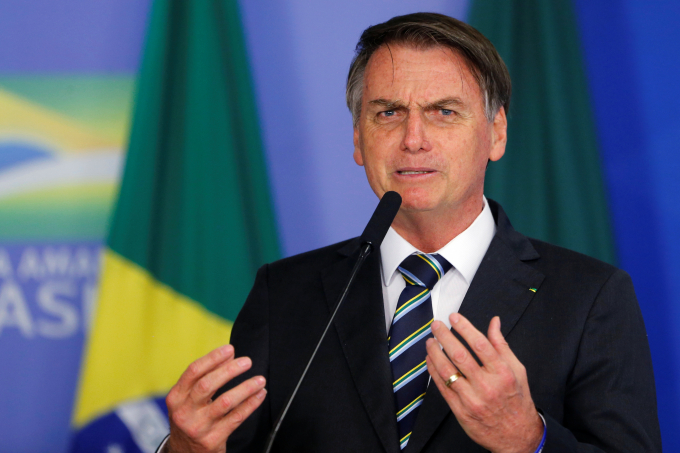 Tổng thống Brazil Bolsonaro bị người tiền nhiệm ví như 'người tiền sử'. Ảnh: Reuters.
