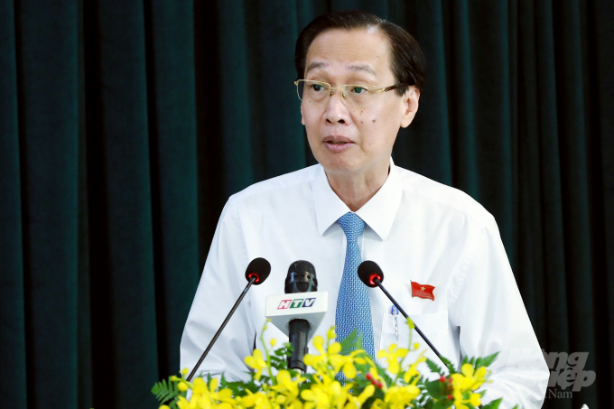 Ông Lê Thanh Liêm, Phó Chủ tịch Thường trực UBND TP.HCM báo cáo tại Kỳ họp thứ 20, HĐND TP.HCM khóa IX ngày 9/7. Ảnh: Ng.N.