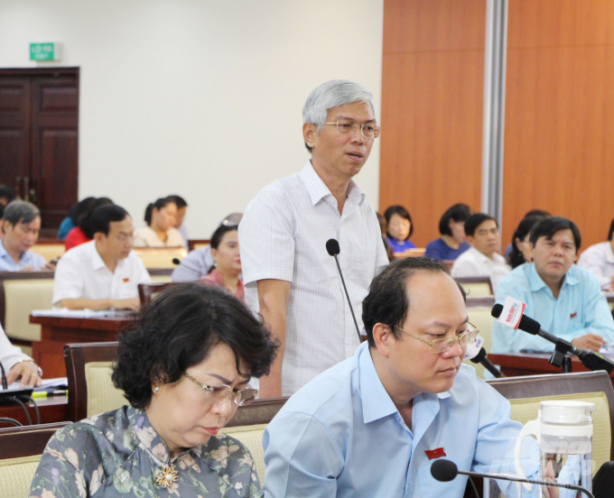 Phó Chủ tịch UBND TP.HCM Võ Văn Hoan phát biểu tại buổi làm việc thứ hai Kỳ họp thứ 20 HĐND TP.HCM Khóa IX diễn ra sáng ngày 10/7. Ảnh: N.Hoàng.