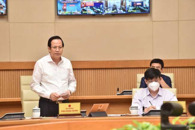 Bộ trưởng Bộ LĐ-TBXH Đào Ngọc Dung báo cáo tại Hội nghị. Ảnh: Đoàn Bắc.