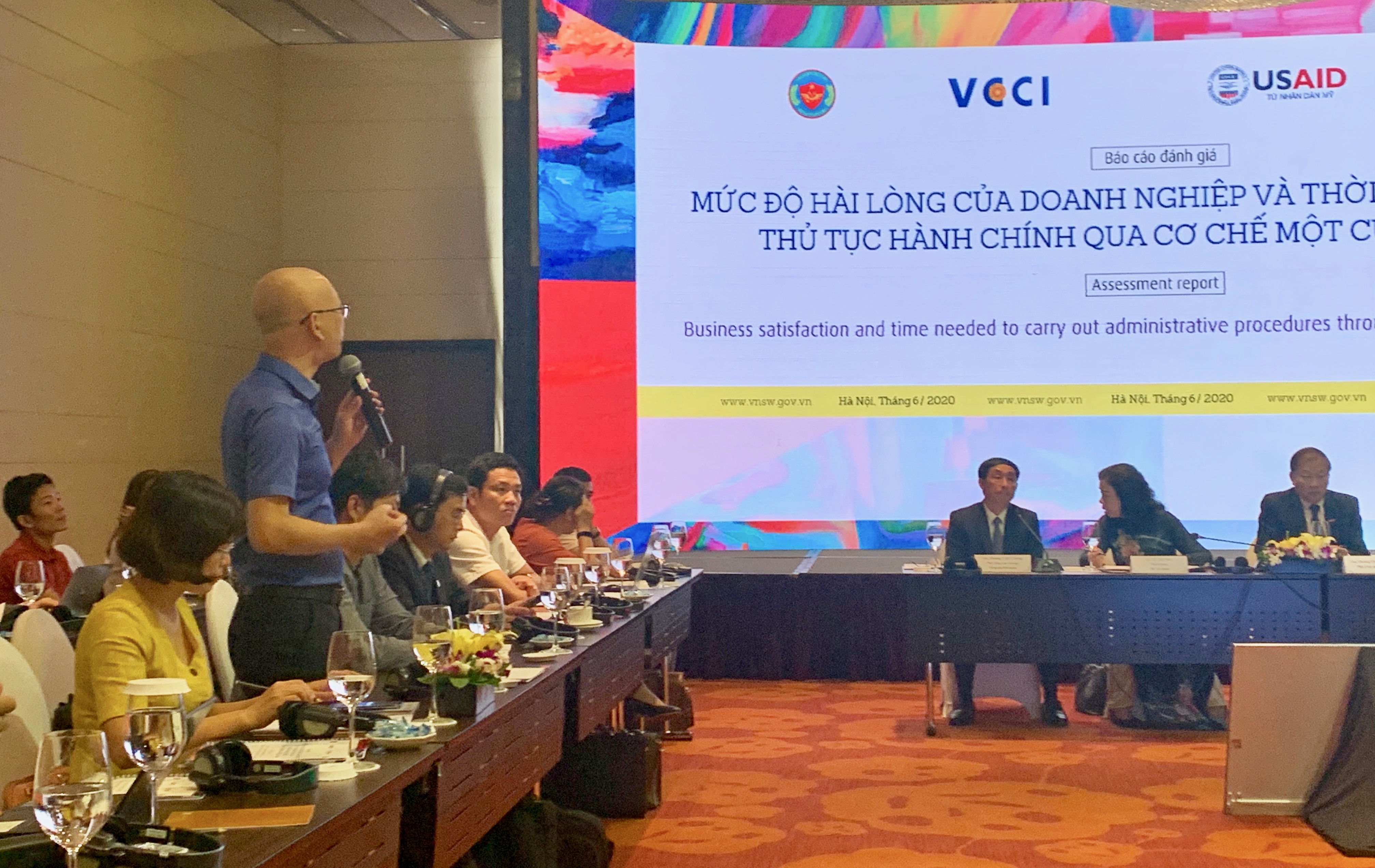 Hội thảo công bố báo cáo 'Đánh giá mức độ hài lòng của doanh nghiệp và thời gian thực hiện thủ tục hành chính qua cơ chế MCQG'. Ảnh: Đại sứ quán Mỹ tại Việt Nam.