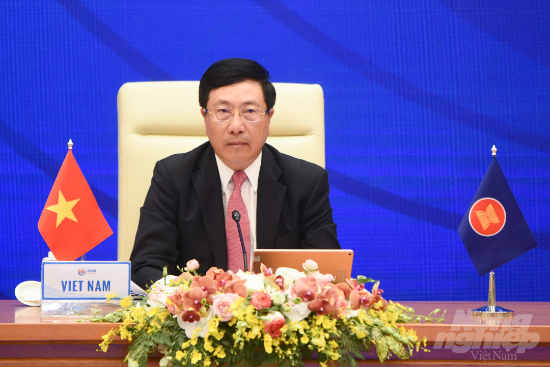 Thay mặt Chủ tịch ASEAN 2020, Phó Thủ tướng, Bộ trưởng Ngoại giao Phạm Bình Minh cho rằng đây là giai đoạn 'Lửa thử vàng, gian nan thử sức' của ASEAN. Ảnh: Tùng Đinh.