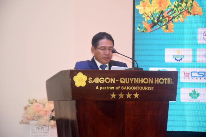 Ông Lê Minh Thiện, Chủ tịch FPA Bình Định, báo cáo những thành tựu trong hoạt động của ngành gỗ trong năm 2021. Ảnh: V.Đ.T