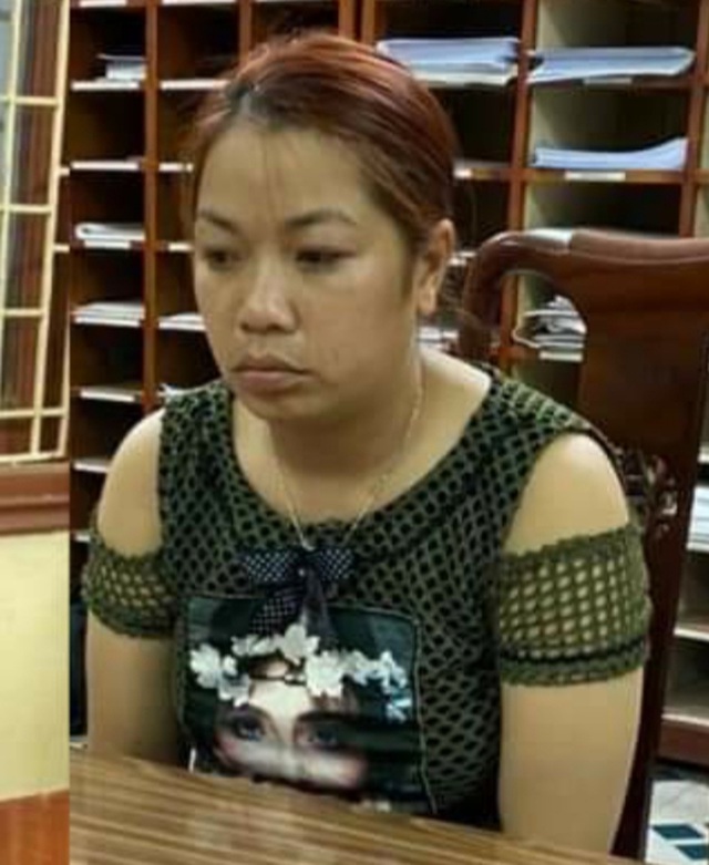 Đối tượng Nguyễn Thị Thu tại cơ quan điều tra. Ảnh: AL.