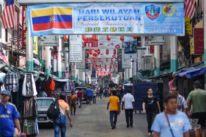 watermark_12-6-my-tom-dat-viet-choi-dau-mo-trung-quoc-ca-ri-an-do-2046_20210524_344.jpg Phố Jalan Petaling ở khu người Hoa của Kuala Lumpur, ban ngày là đường đi, ban đêm là chợ. Ảnh: Tùng Đinh.