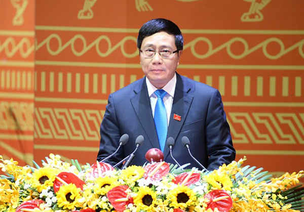 Đồng chí Phạm Bình Minh, Ủy viên BCH Trung ương Đảng, Phó Thủ tướng Chính phủ, Bộ trưởng Bộ Ngoại giao trình bày tham luận trong phiên họp sáng 23/1. Ảnh: dangcongsan.vn