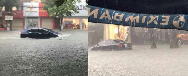 Nhiều phương tiện ô tô chết máy giữa đường ngập sâu ở TP Vinh