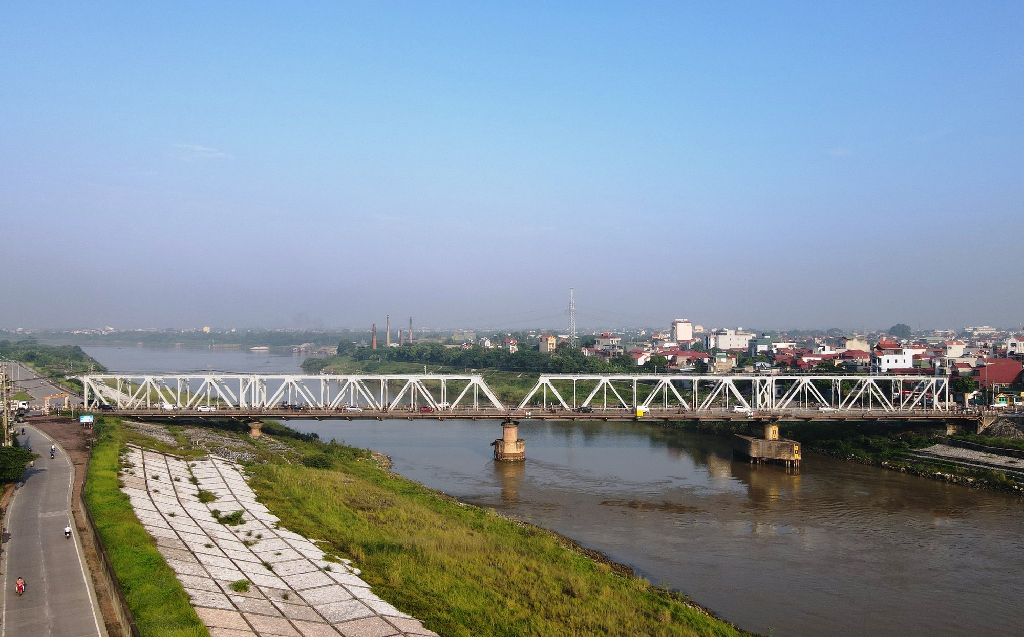 Phê duyệt Khung chính sách bồi thường, tái định cư Dự án nâng cao tĩnh không cầu đường bộ - Ảnh 1. Phê duyệt Khung chính sách bồi thường, tái định cư Dự án nâng cao tĩnh không cầu đường bộ - Ảnh 1.