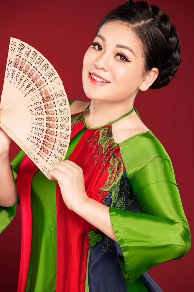 312939521_655617182577454_2700824391019629304_n-192534_957.jpg Ca sĩ kiêm tiến sĩ âm nhạc Anh Thơ.