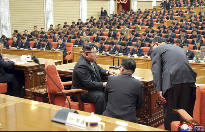 In this photo provided by the North Korean government, North Korean leader Kim Jong Un, third right, speaks with people involved during a meeting of the ruling Workers’ Party at its headquarters in Pyongyang, North Korea Sunday, Feb. 26, 2023. Independent journalists were not given access to cover the event depicted in this image distributed by the North Korean government. The content of this image is as provided and cannot be independently verified. Korean language watermark on image as provided by source reads: 'KCNA' which is the abbreviation for Korean Central News Agency.  Korean Central News Agency/Korea News Service via AP