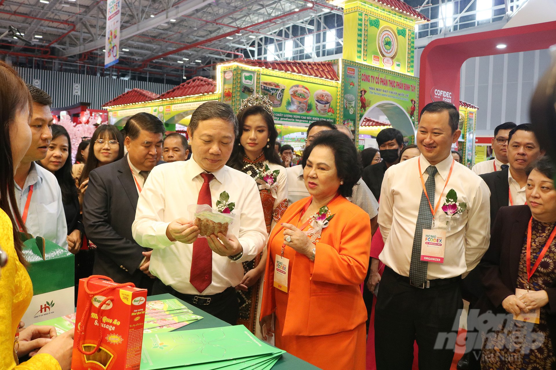 Delegates visit the booths.