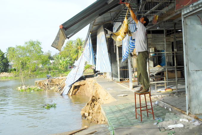 The rainy season has recently started in the Mekong Delta, and multiple instances of riverbank erosion were reported, resulting in submerged civilian houses and damaged traffic infrastructure. Photo: Ho Thao.