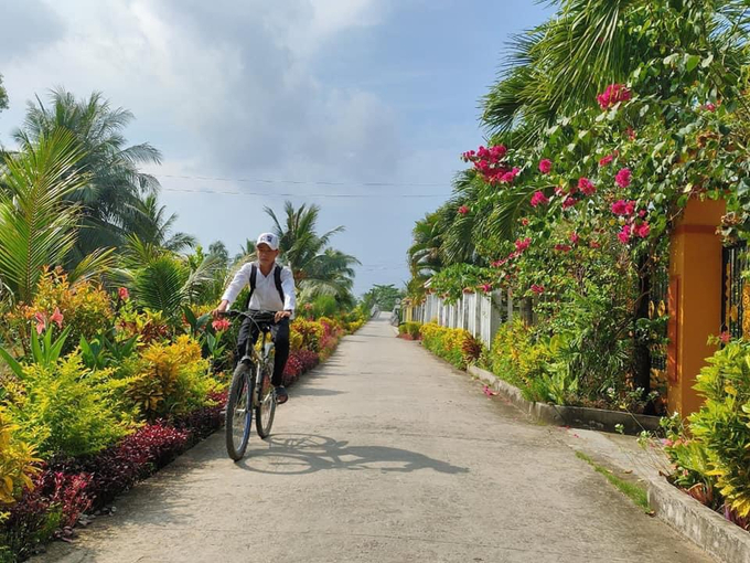 z3748948047555_1f925066aa2161094e60a04475940f30-161232_360.jpg Đường giao thông nông thôn tại một xã đạt chuẩn nông thôn mới. Ảnh: Trọng Linh.