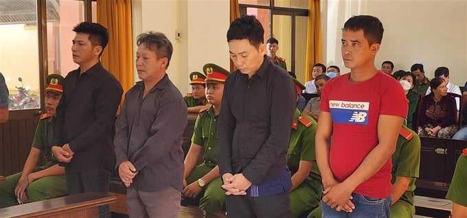 Các bị cáo tại phiên tòa với các cáo buộc liên quan đến chống khai thác IUU. Ảnh: Bộ Công an.