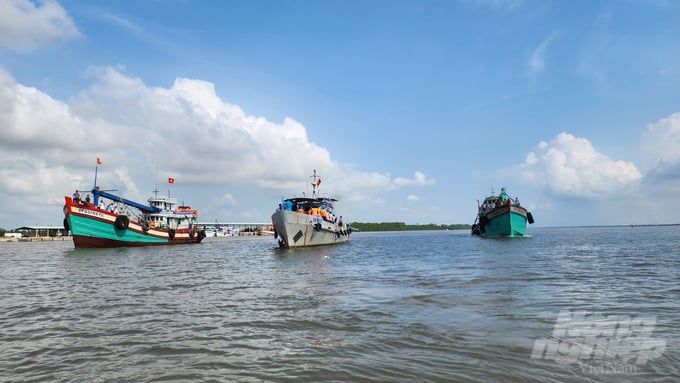 A fleet of three vessels heading for the Tran De coastal area to release seeds into the natural environment. Photo: Kim Anh.
