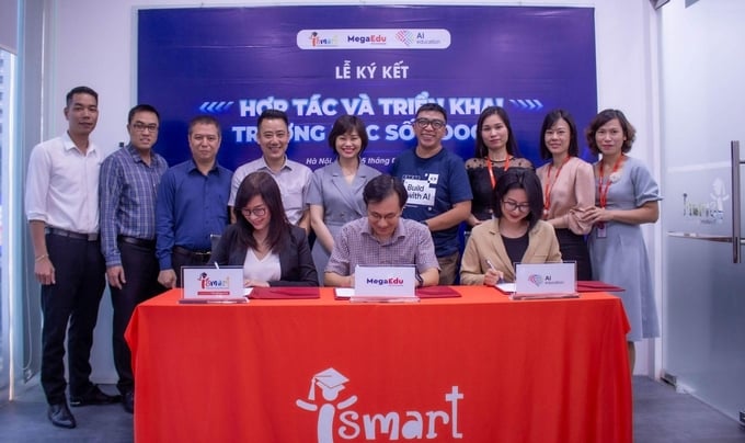 163-142839_326.jpg Các đại biểu tham dự lễ ký kết giữa MegaEdu, iSMART Education và AI Education diễn ra tại Hà Nội. Ảnh: iSmart.