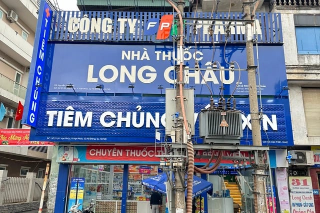 1-154601_579.jpg Một điểm tiêm chủng của trung tâm tiêm chủng Long Châu ở quận Hà Đông.