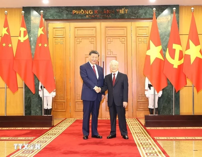 General Secretary Nguyen Phu Trong and General Secretary and President of China Xi Jinping took a photo together. Photo: Tri Dung/VNA.