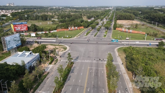 duong-vanh-dai-4-my-phuoc-ben-cat-binh-duong-085510_994-085510.jpg Một đoạn đường vành đai 4 qua khu vực Mỹ Phước, Bến Cát, Bình Dương đã được đầu tư xây dựng. Ảnh: Trần Phi.