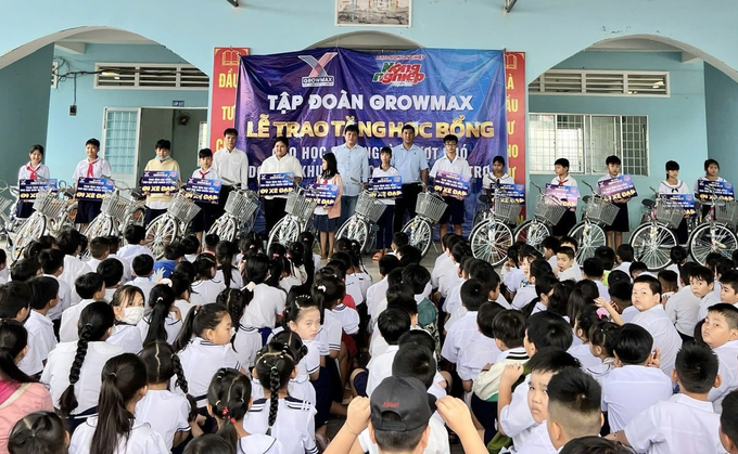 hon-50-xe-dap-growmax-den-voi-hoc-sinh-ngheo-mien-bien-tra-vinh-153447_358.jpg
