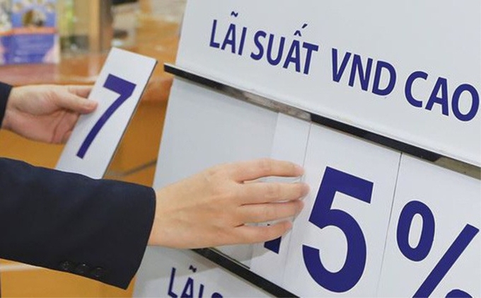 0236-lai-suat-ngan-hang-15144001-140720_574.jpeg Nhiều ngân hàng đồng loạt giảm lãi suất tiết kiệm. Ảnh minh họa.