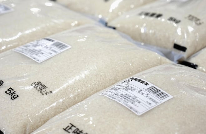 Bags of reserve rice released from government stockpiles through direct contracts with retailers hit the shelves at an Aeon supermarket in the western Japan city of Osaka on June 2, 2025. Photo: Kyodo.