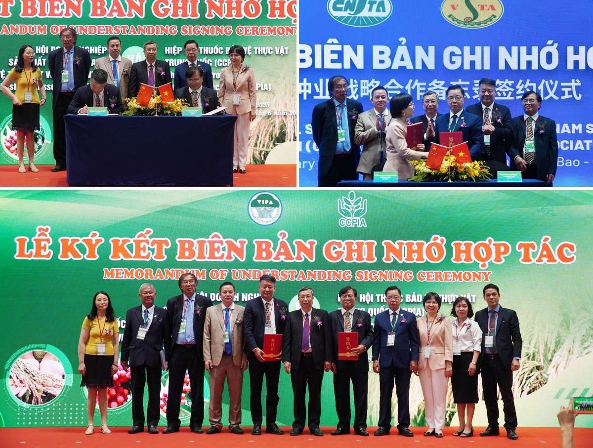 Signing ceremony on cooperation in the research, development, and commercialization of crop varieties and agricultural materials between Vietnam and China. Photo: Nguyen Thuy.