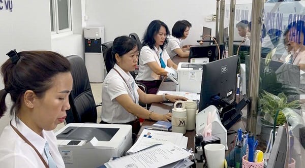 Các địa phương đang tập trung cao độ để xử lý hồ sơ, thủ tục liên quan đến lĩnh vực đất đai một cách nhanh nhất. Ảnh: Thùy Linh.