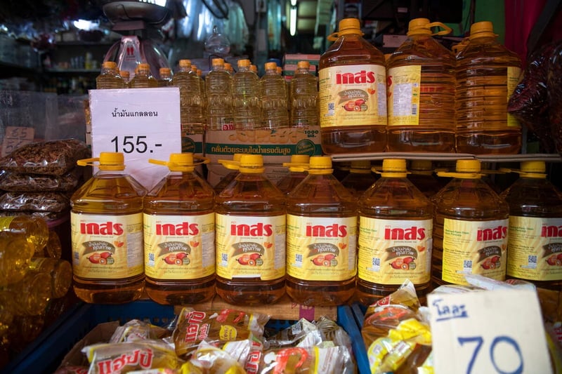 Palm and soybean oil for sale at the Klongtoey market in Bangkok, Thailand.