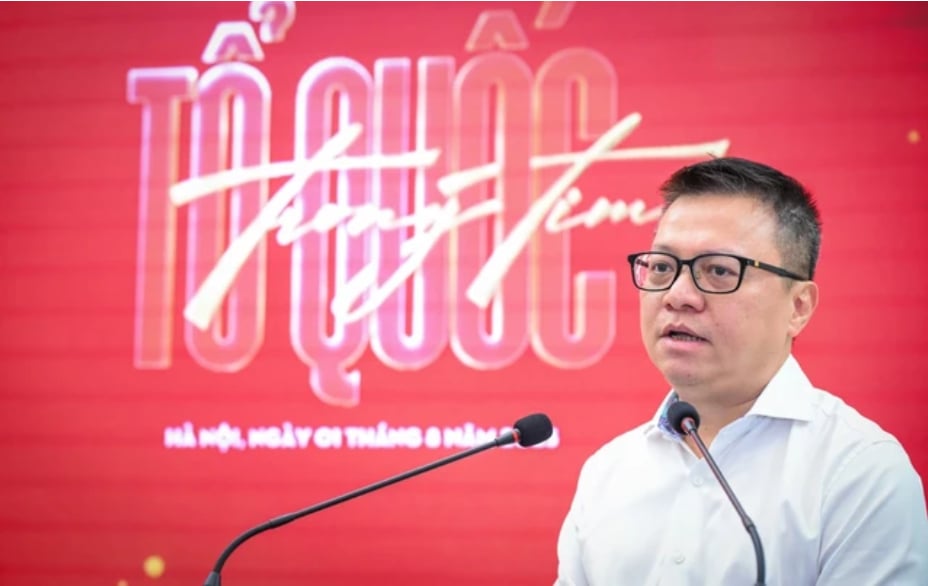 Ông Lê Quốc Minh, Tổng Biên tập Báo Nhân Dân: 'Tổ quốc trong tim' là một bản giao hưởng của lòng yêu nước. Ảnh: Thành Đạt.