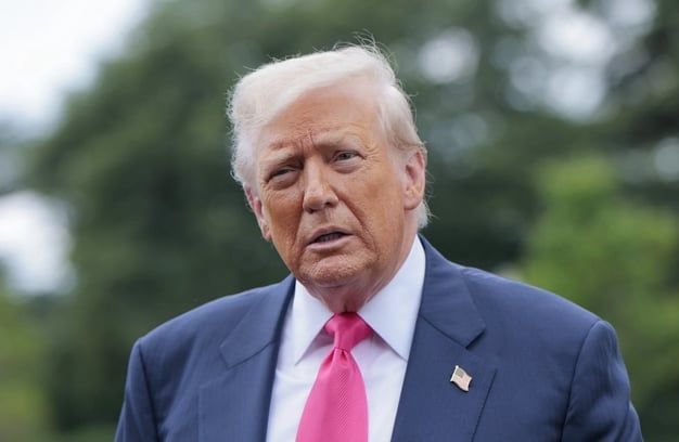 President Donald Trump speaks to the media as he departs the White House on July 15, 2025, in Washington. Photo: Anna Moneymaker.