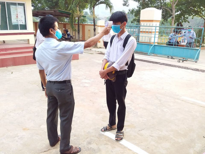 Tất cả thí sinh tham dự kỳ thi tốt nghiệp THPT năm 2020 sẽ được kiểm tra thân nhiệt. Ảnh: CĐ.