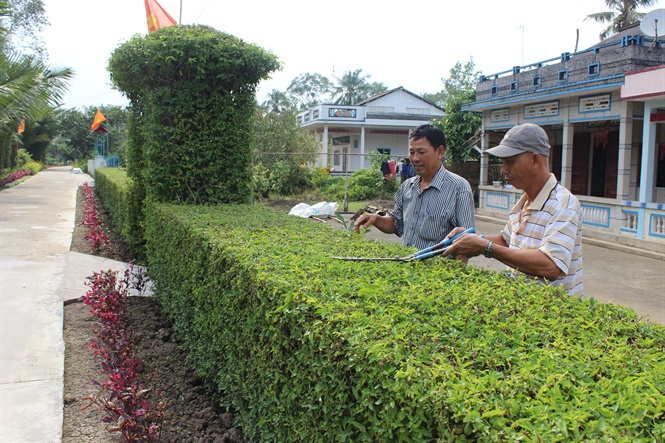 06-26-08_1_qung_cnh_x_nong_thon_moi_vi_thng