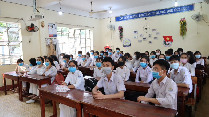 Từ ngày 14/2, học sinh nhiều cấp ở các địa phương có dịch cấp độ 1 và 2 sẽ đi học trực tiếp. Ảnh minh hoạ.