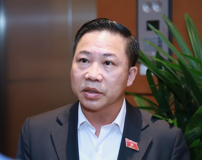 luu-binh-nhuong-nnvn-142543_258.jpeg Đại biểu Lưu Bình Nhưỡng - Phó Trưởng ban Dân nguyện của Quốc hội, đại biểu tỉnh Bến Tre bên hành lang Quốc hội. Ảnh: Minh Phúc.